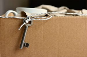 Box with a key hanging out.