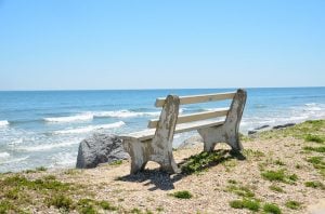 Top places for families in South Florida. Bench, sky and water.