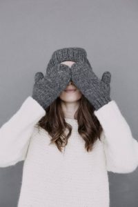 Girl with gloves and winter hat