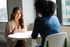 Two women talking