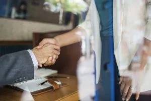 people shaking hands