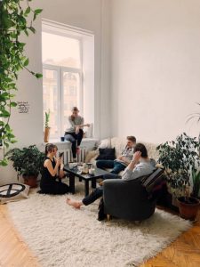 People sitting in the living room and talking